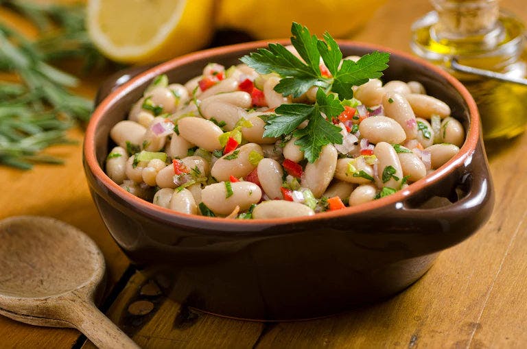 White bean and mint salad in a bowl.