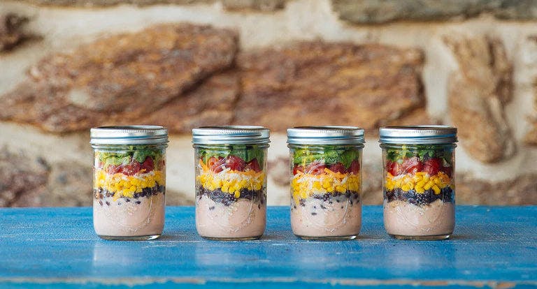 Fresh Mason Jar Salad with Colorful Veggies and Greens