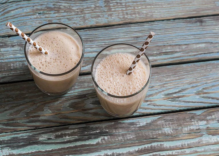 Refreshing chocolate orange mango protein smoothie