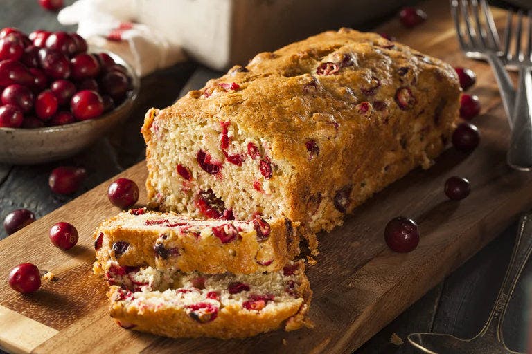 Cranberry Citrus Glazed Bread on a white plate