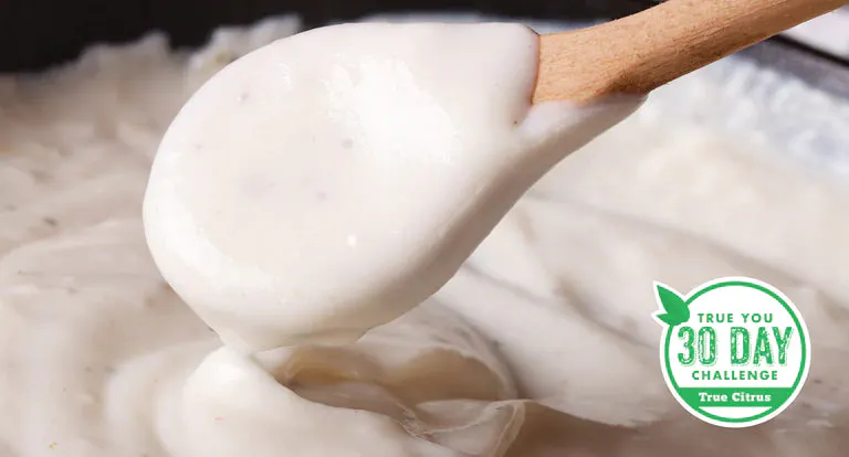 Creamy Alfredo sauce with fresh herbs and vegetables
