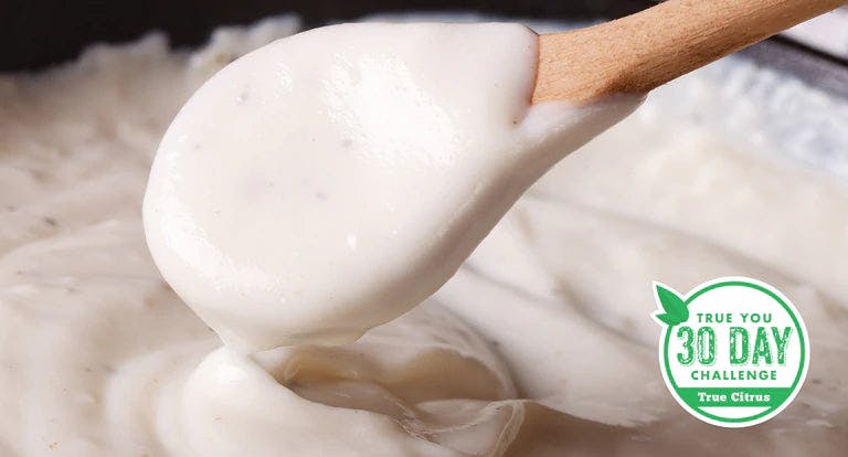 Creamy Alfredo sauce with fresh herbs and vegetables