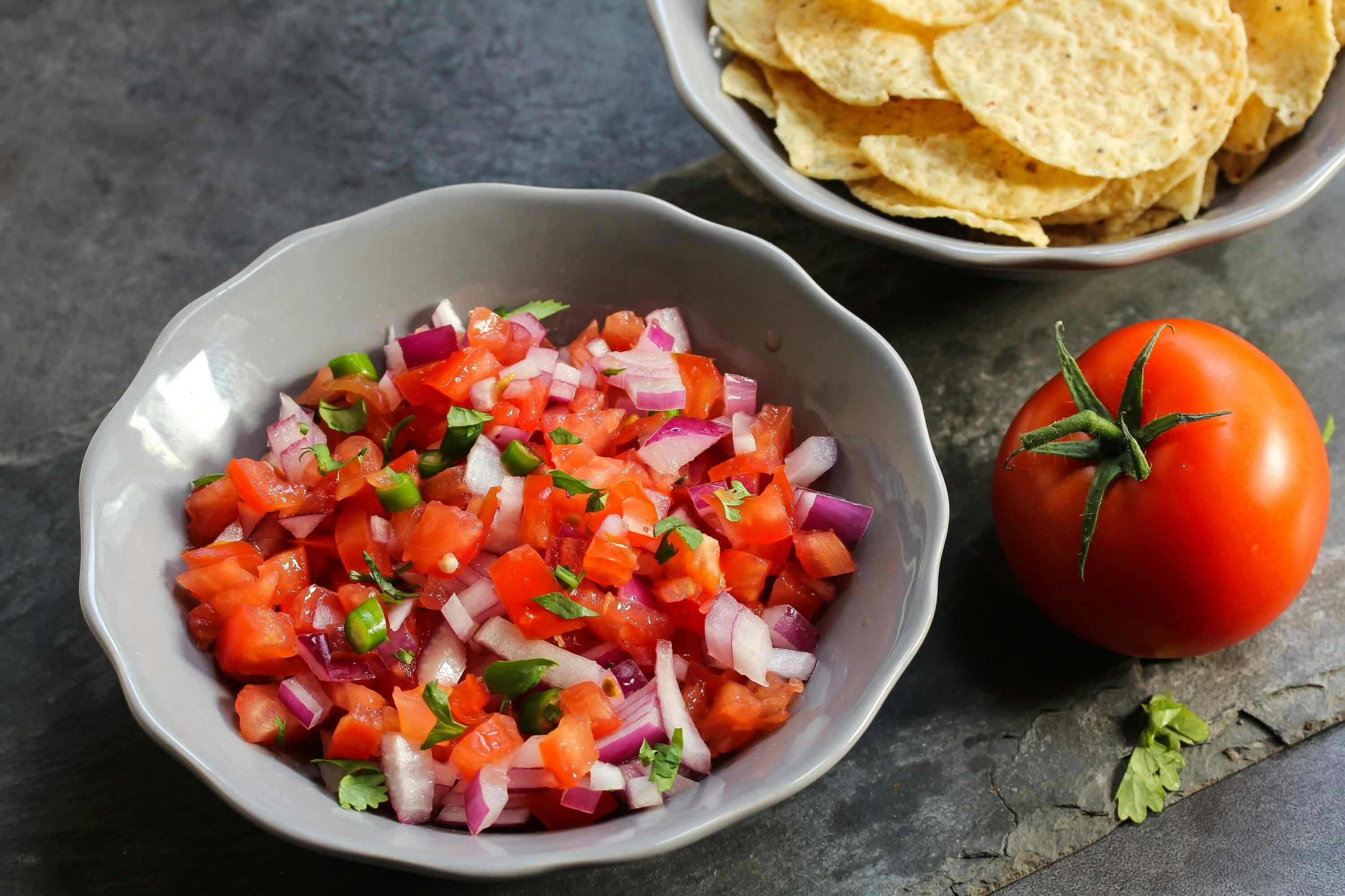 Fresh true lime tomato salsa in a bowl