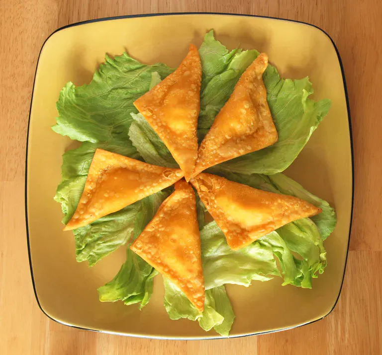 Crispy lemon crab triangles with creamy lemon dipping sauce