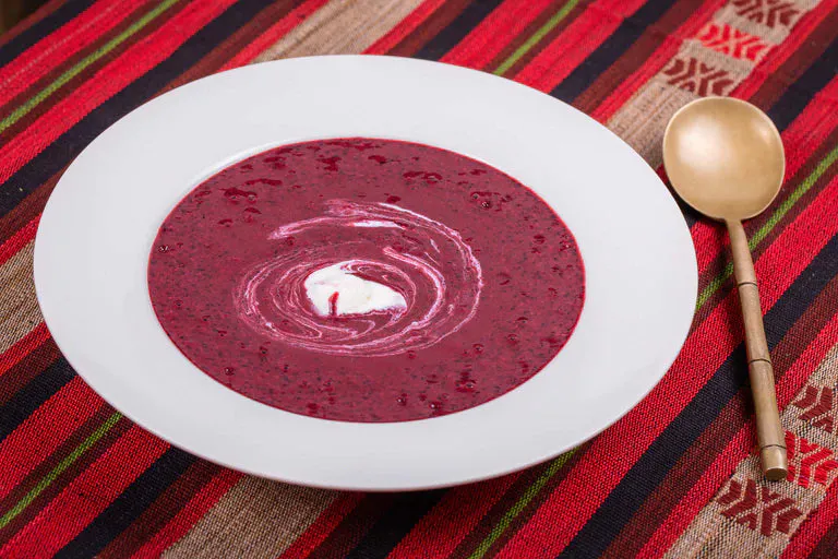 A bowl of delicious Danish fruit soup with fresh fruits and a touch of sweetness