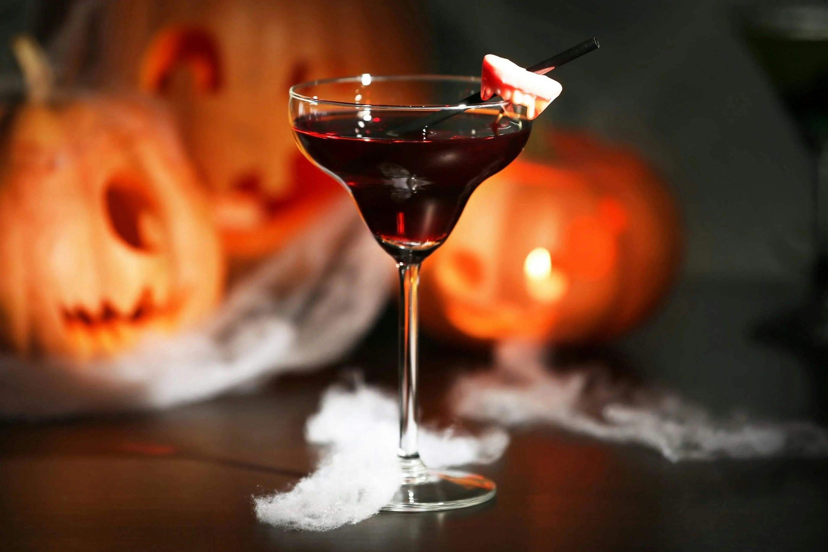 Refreshing True Lemon Black Currant Punch served in a margarita glass on a fall tablescape