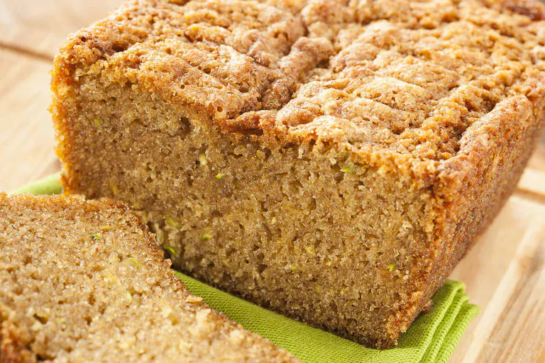 A loaf of freshly baked true lemon zucchini bread