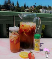 True Shisho Lemonade Recipe - Lemonade Pitcher with ice and in a reusable water bottle