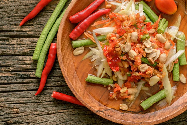 Fresh green papaya salad with a zesty dressing