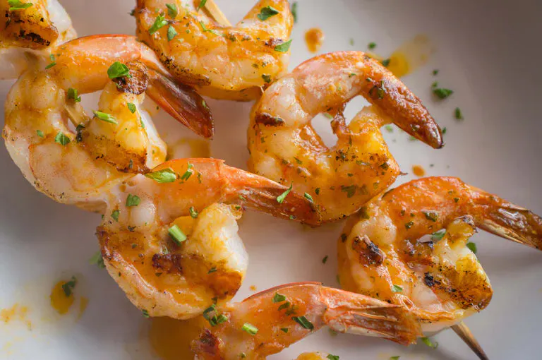 Grilled True Citrus Shrimp on 2 skewers.