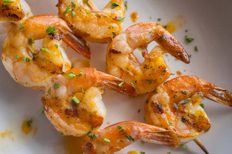 Grilled True Citrus Shrimp on 2 skewers.