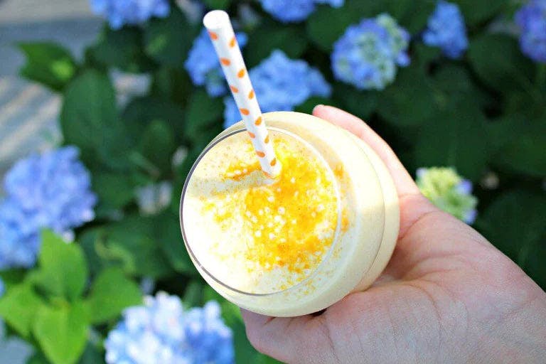 Refreshing mango, turmeric, and lemon smoothie
