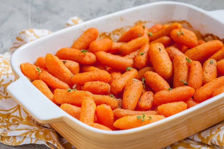 Freshly harvested true lemon basil carrots