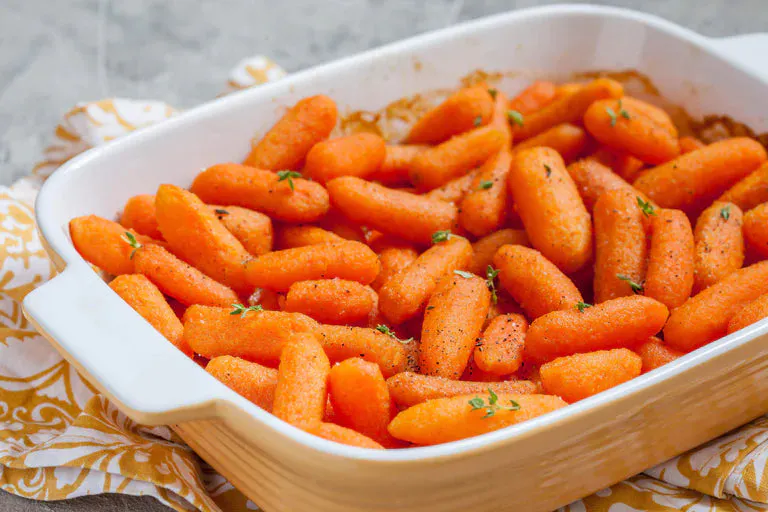 Freshly harvested true lemon basil carrots