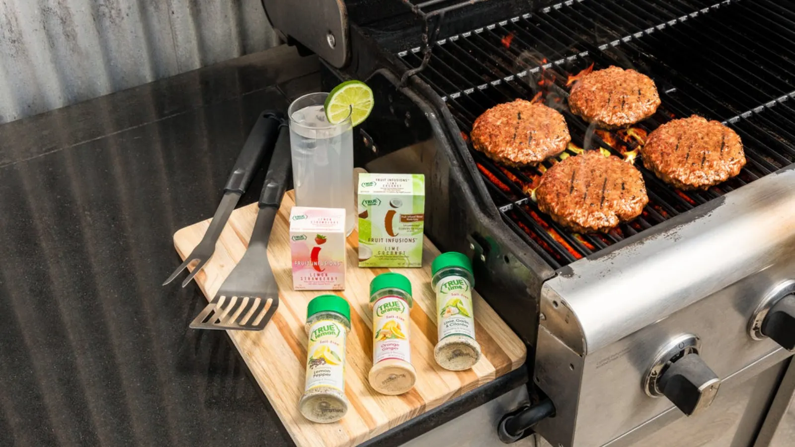 A grill with True Lemon products on the side table.