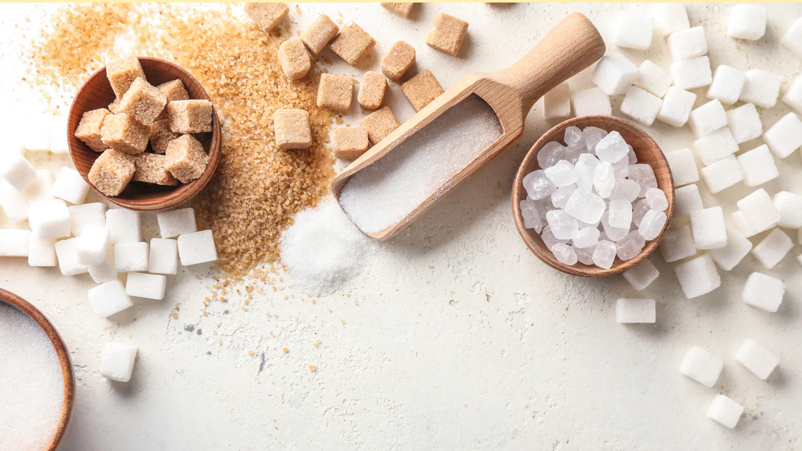 Stevia, Splenda, and other sugar replacements laid out on a table.
