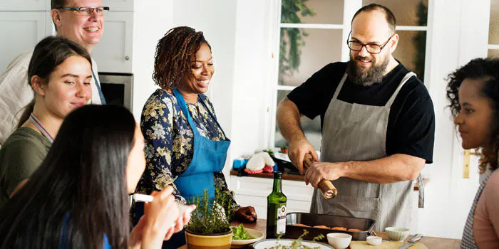 group of people cooking together