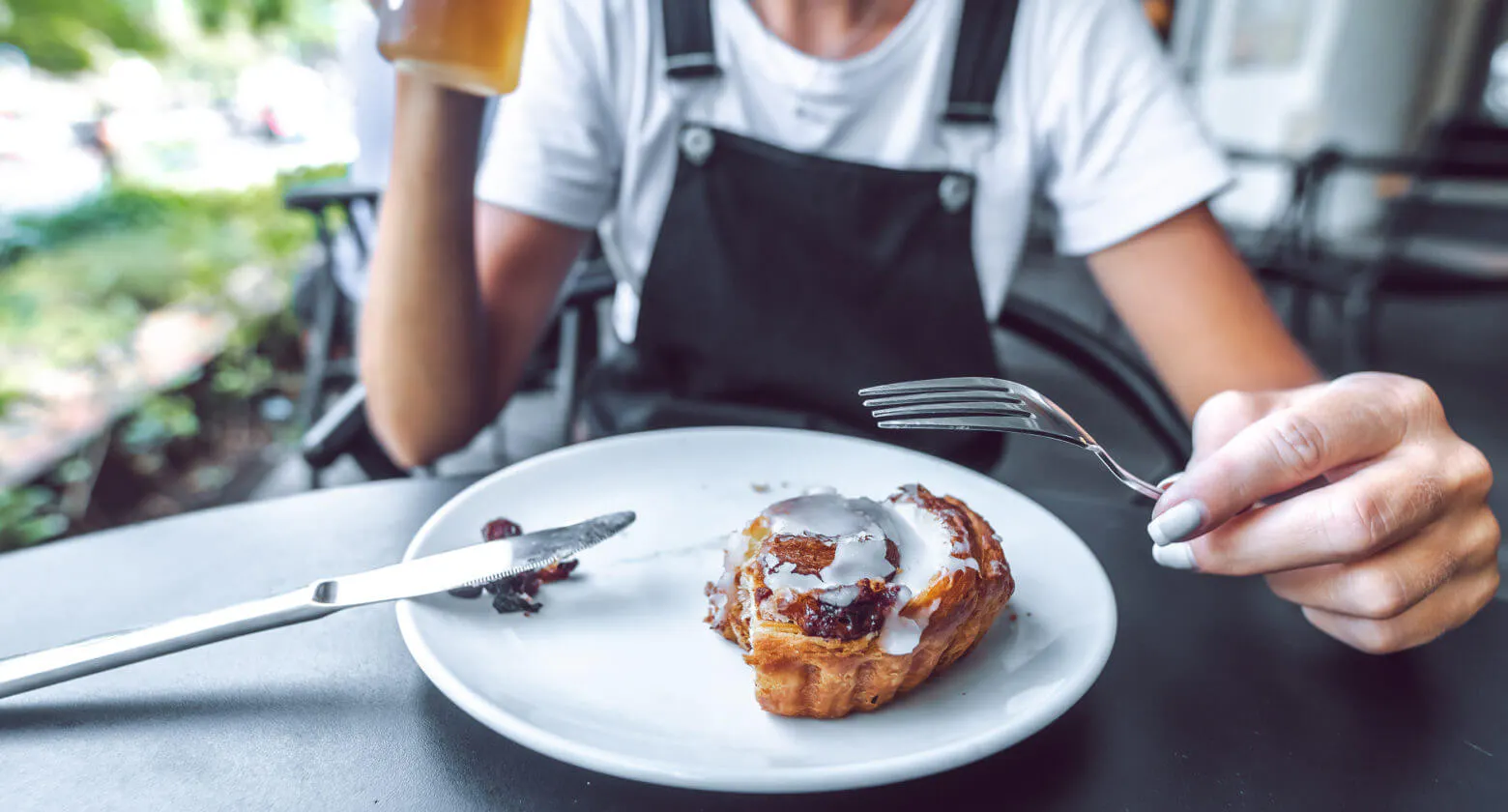 half eaten pastry on a plate