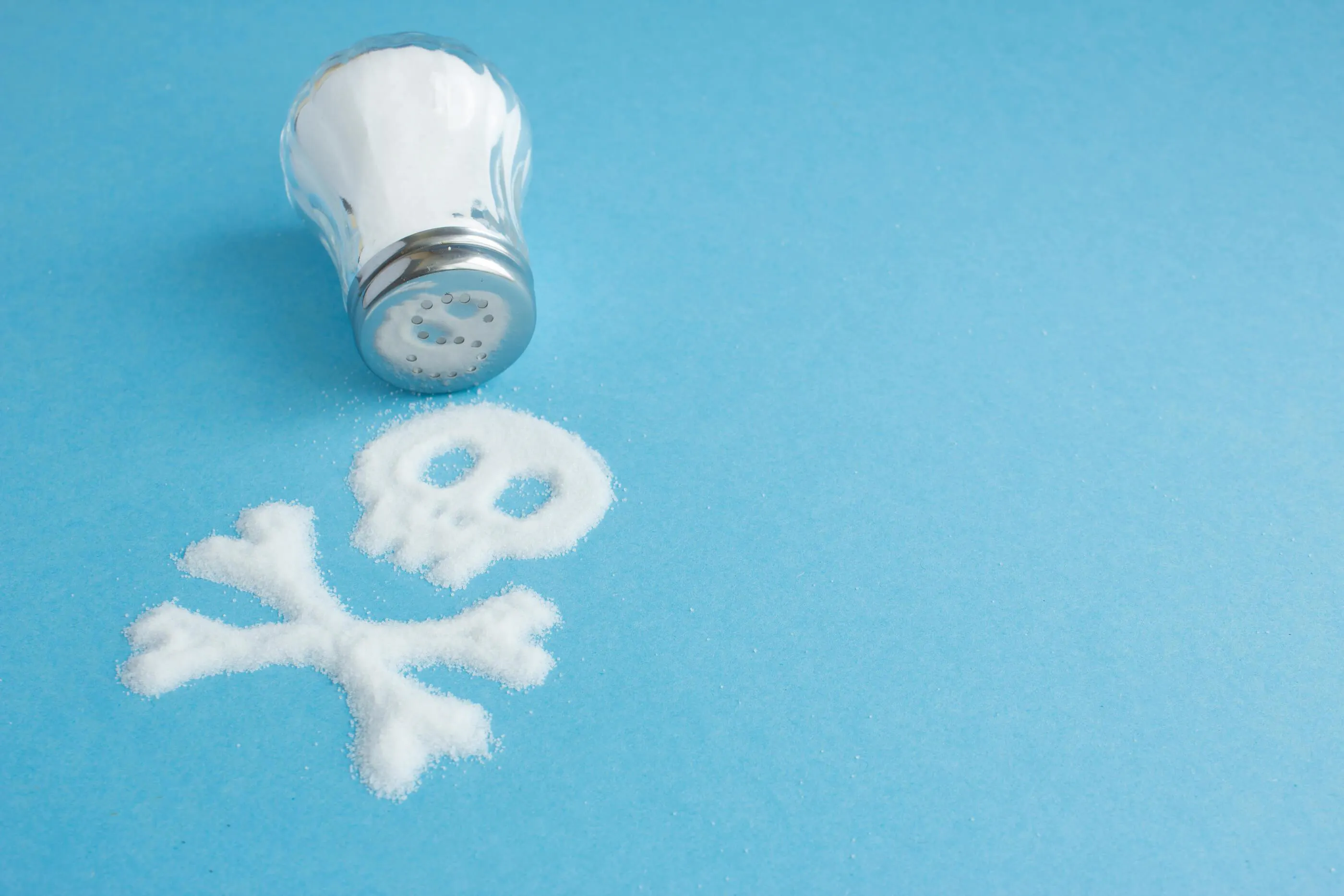 salt spilled to look like a skull and crossbones
